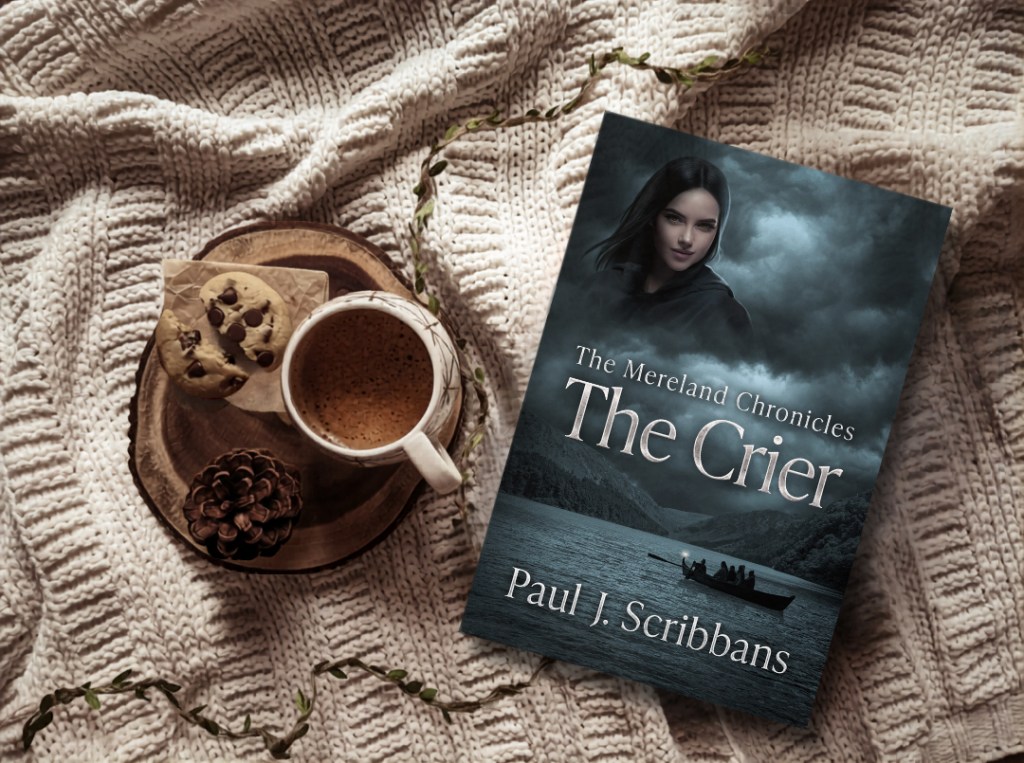 Promotional image of The Mereland Chronicles: The Crier by Paul J. Scribbans displayed on a knitted blanket beside a cup of coffee and cookies.