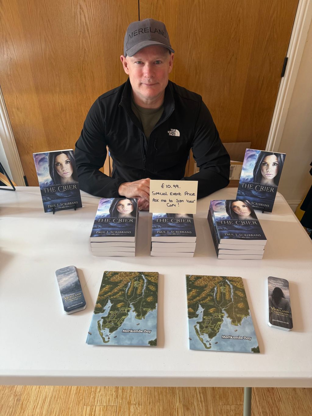 P.J. Scribbans at the Furness Book Fair at Swarthmoor Hall with copies of The Mereland Chronicles: The Crier.