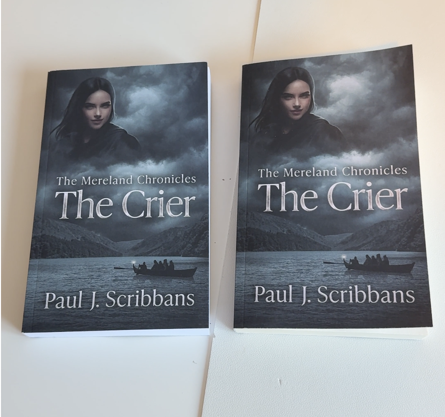 Side-by-side comparison of Amazon KDP Standard White paper and Groundwood paper using two paperback copies of The Mereland Chronicles: The Crier, highlighting differences in page colour, texture, weight and print appearance.